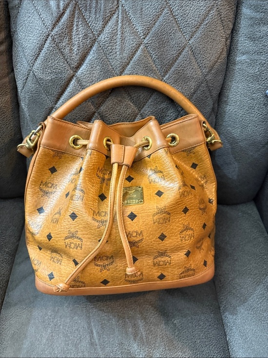 MCM Handbags - MCM Cognac Visetos Drawstring Bucket Shoulder Bag